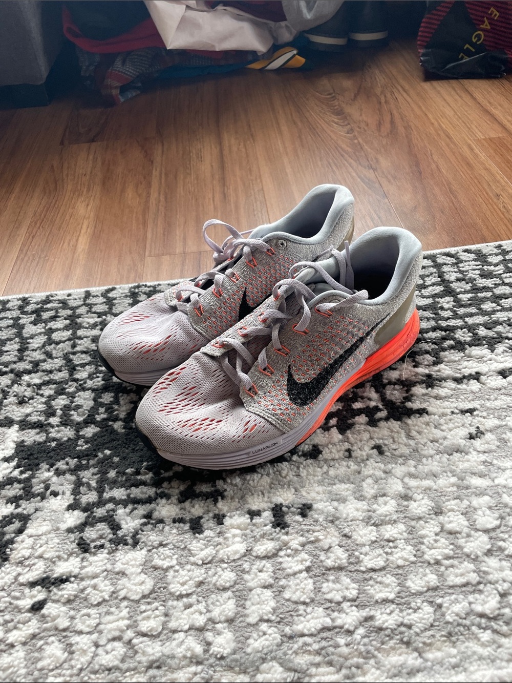 Nike Light Gray and Neon Coral Mesh Running Shoes with Black Swoosh
